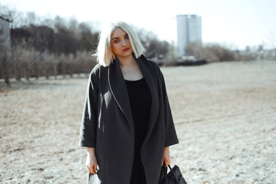 The Symbiosis of Luxury Handbags and Designer Dresses